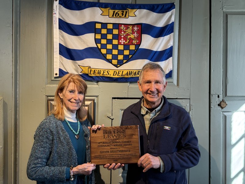 Gavin Braithwaite, right, receives the Lewes Chamber of Commerce’s Dennis Forney Community Service Award from Betsy Reamer, executive director. SUBMITTED PHOTO